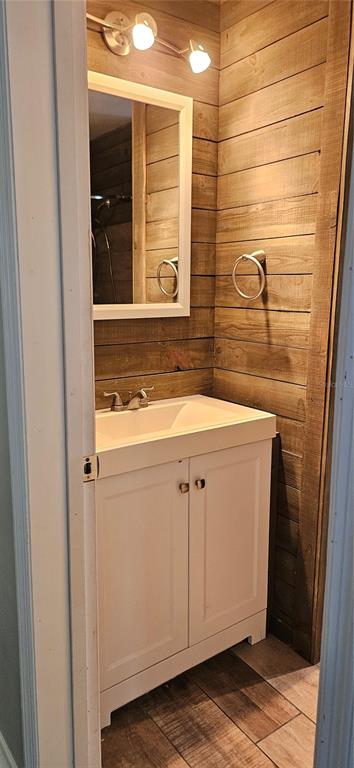 2075 North Keene Road Clearwater, FL 33755 - Photo 13 of 31 a bathroom with a sink and mirror