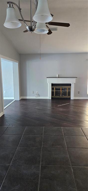 2075 North Keene Road Clearwater, FL 33755 - Photo 15 of 31 a view of a livingroom with a ceiling fan and window