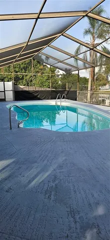 a view of backyard with porch