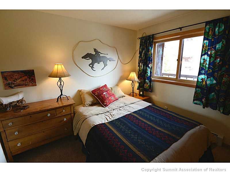 9460 Ryan Gulch Road, Unit 82 Silverthorne, CO 80498 - Photo 13 of 25 Bedroom. Guest bedroom