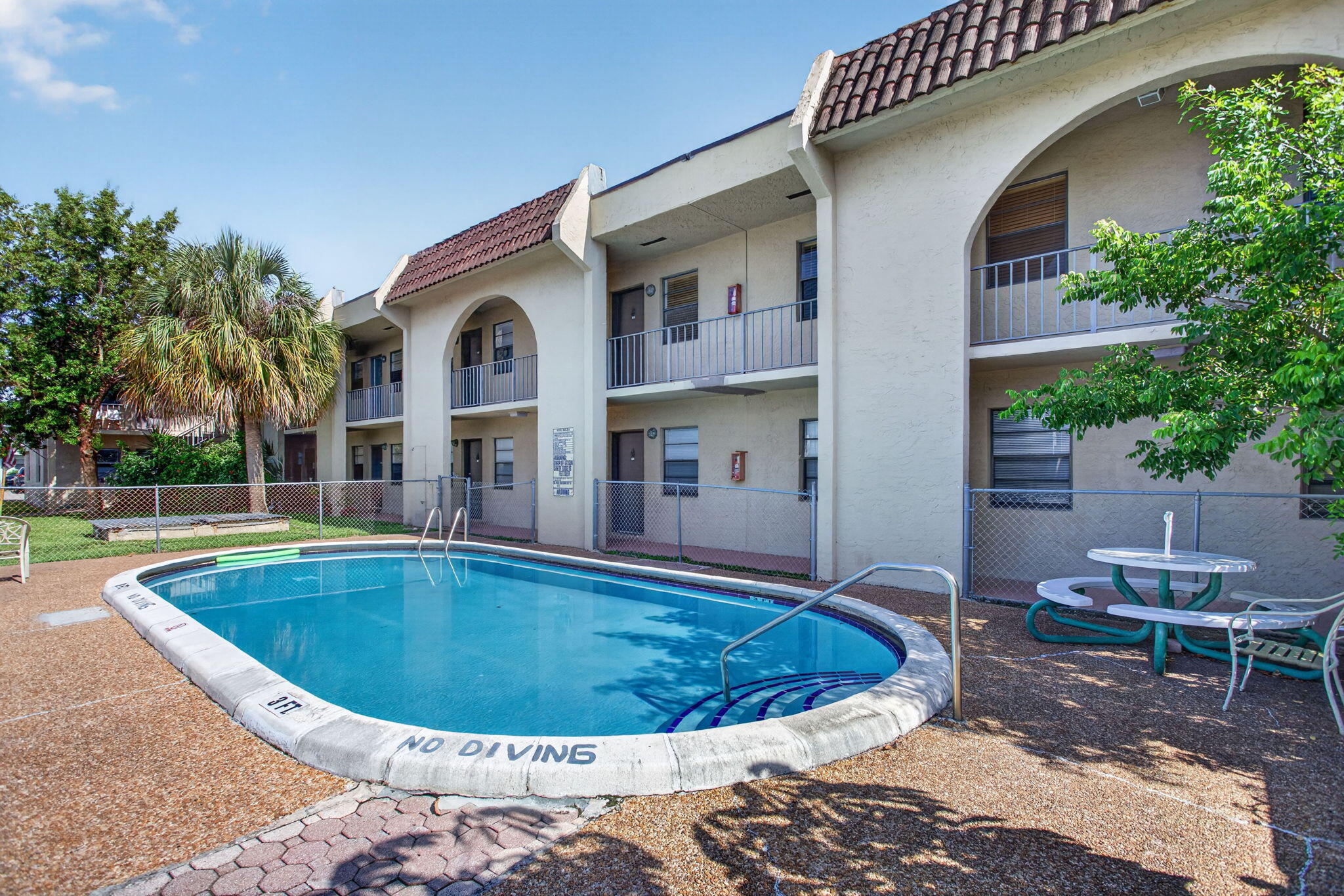 2141 Northeast 42nd Street, Unit 101 Lighthouse Point, FL 33064 - Photo 1 of 17 1-web-or-mls-2141-0986