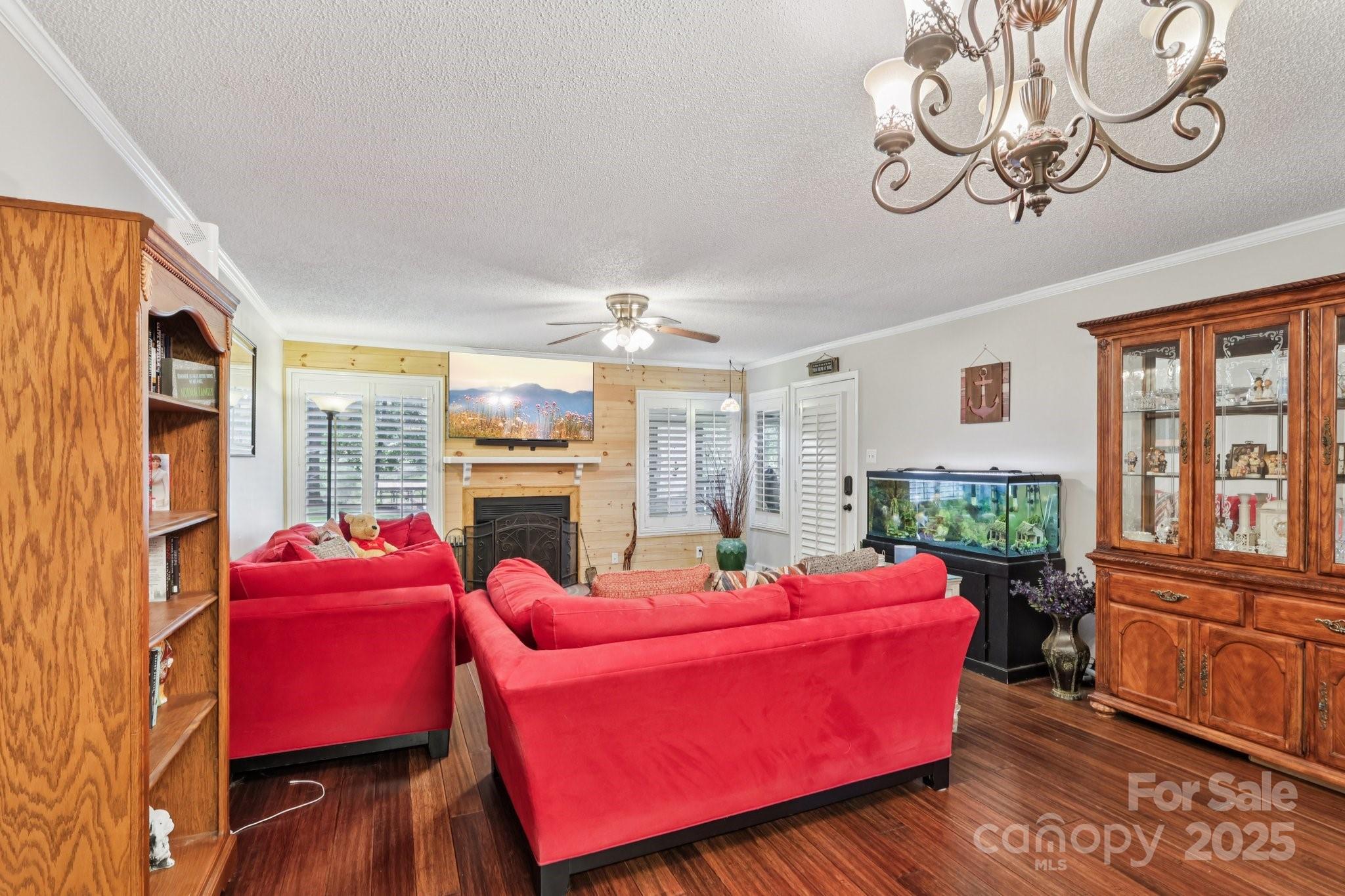 1590 Springpoint Road, Unit E Rock Hill, SC 29732 - Photo 20 of 38 a living room with furniture fireplace and flat screen tv