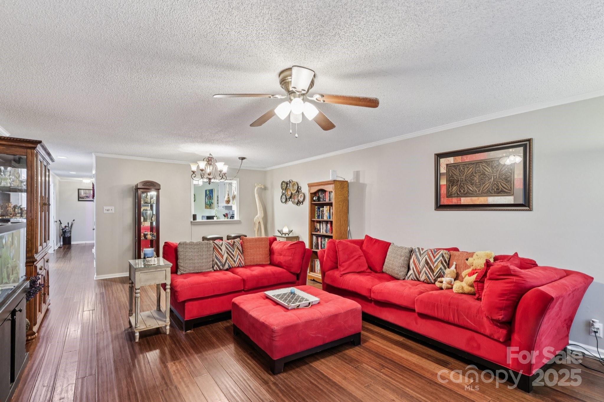 1590 Springpoint Road, Unit E Rock Hill, SC 29732 - Photo 23 of 38 a living room with furniture a flat screen tv and a couch