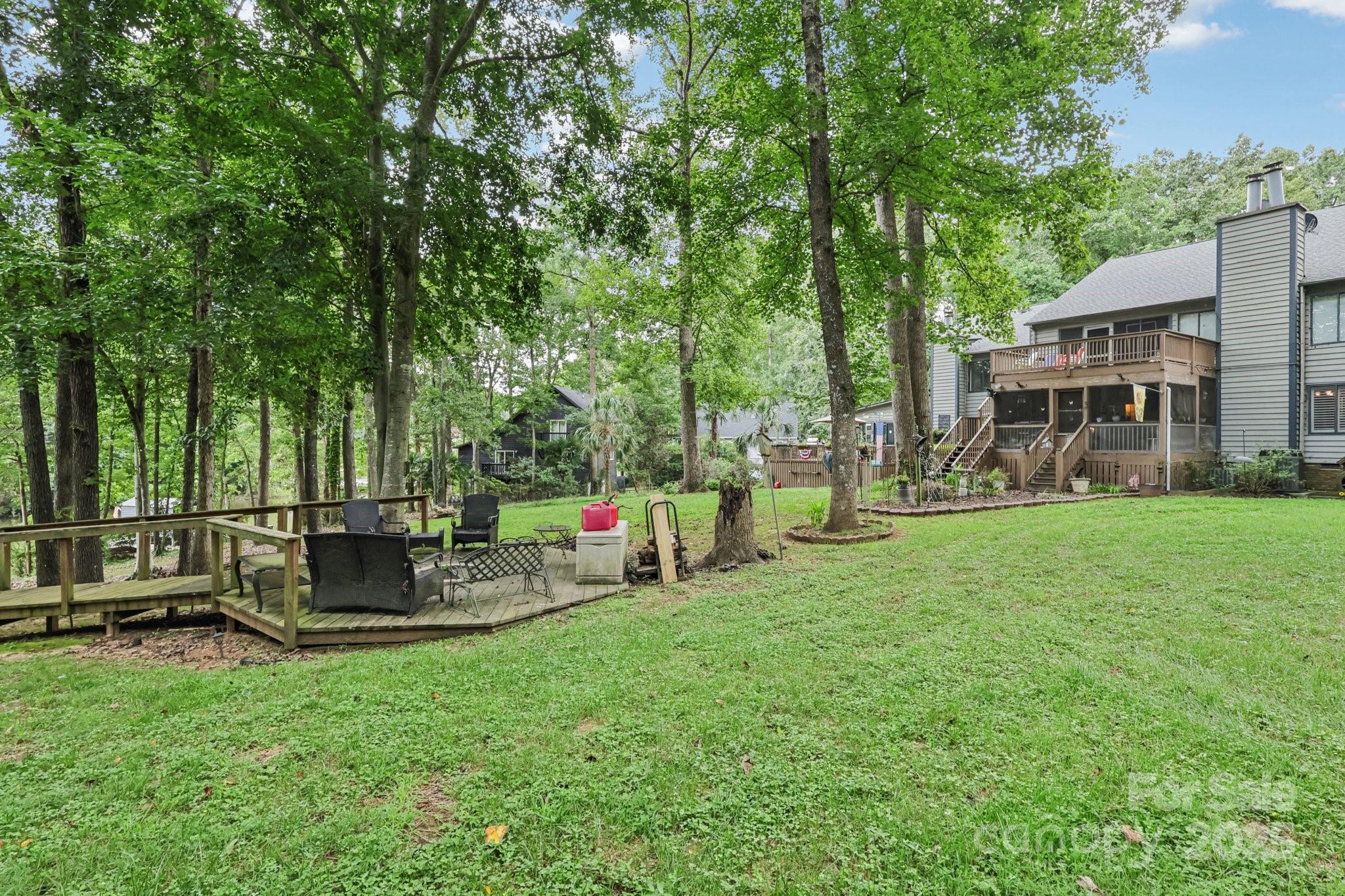 1590 Springpoint Road, Unit E Rock Hill, SC 29732 - Photo 34 of 38 a view of a house with backyard and sitting area