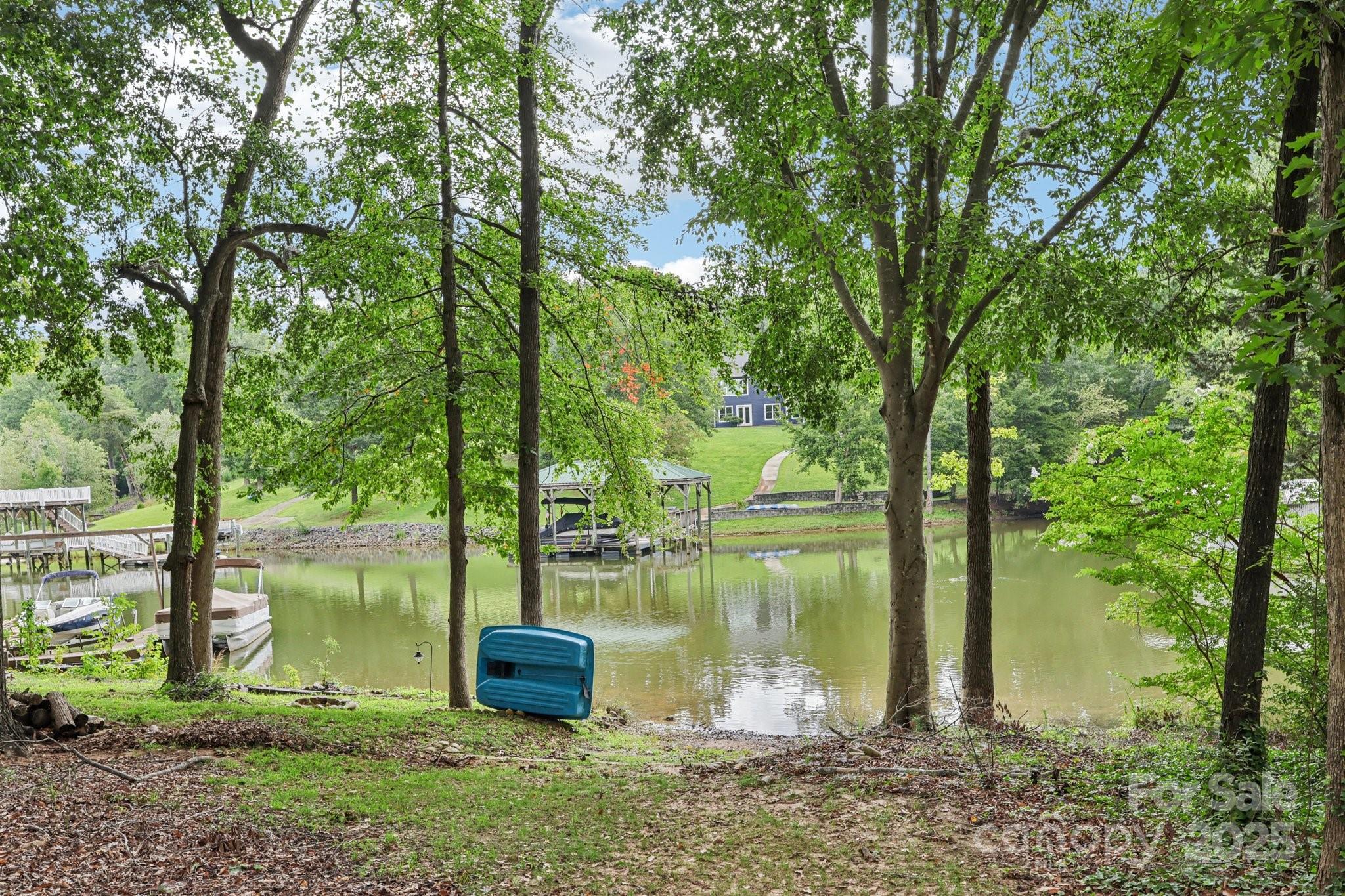 1590 Springpoint Road, Unit E Rock Hill, SC 29732 - Photo 37 of 38 a view of a lake from a yard
