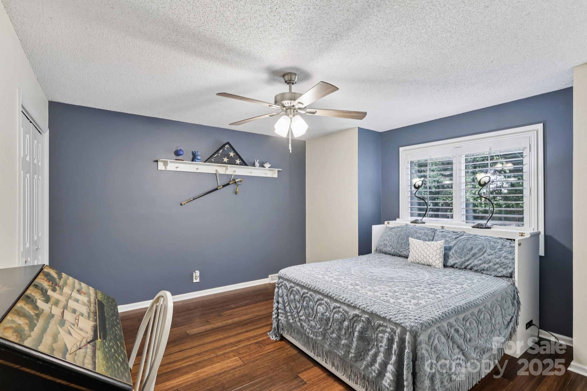 1590 Springpoint Road, Unit E Rock Hill, SC 29732 - Photo 7 of 38 a bedroom with a bed and window
