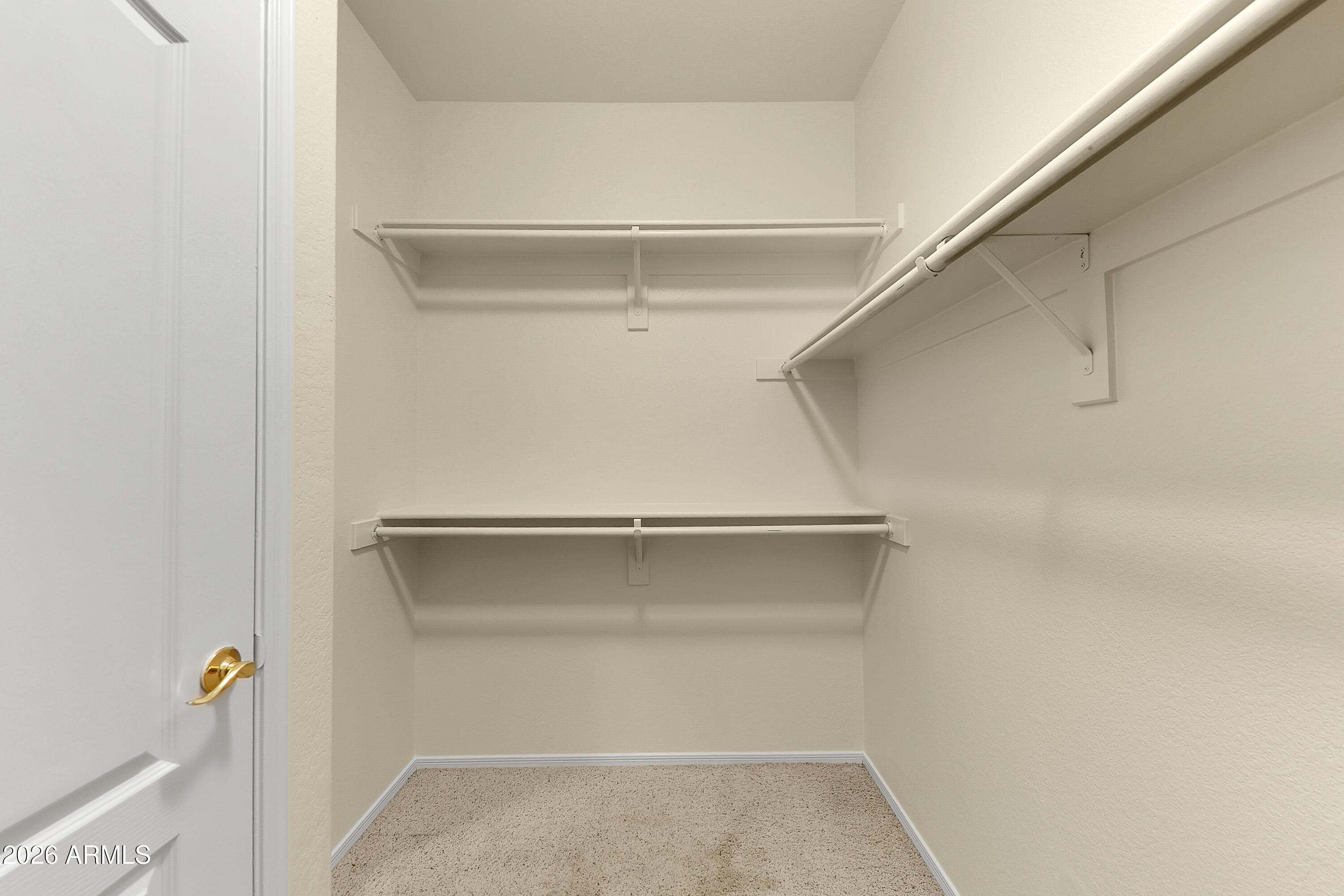 1819 West Nighthawk Way Phoenix, AZ 85045 - Photo 20 of 25 a view of an empty walk in closet