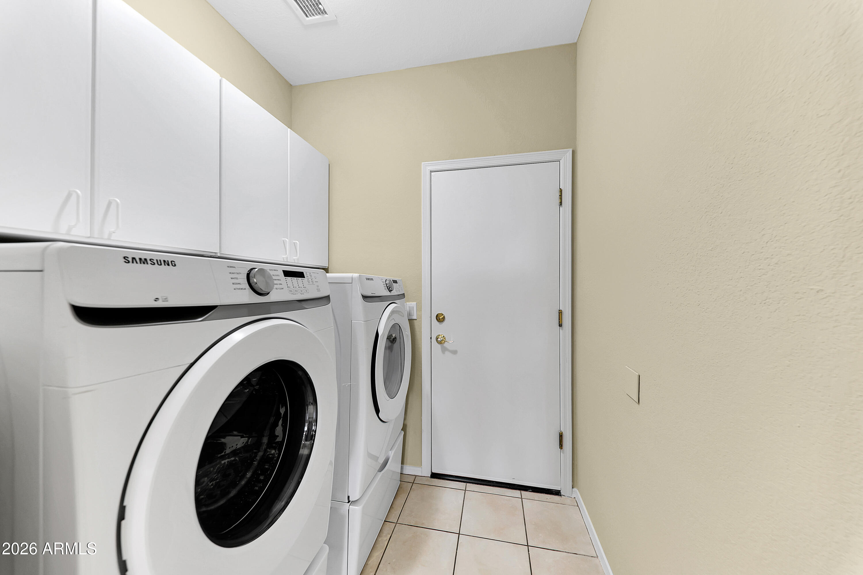1819 West Nighthawk Way Phoenix, AZ 85045 - Photo 24 of 25 a utility room with dryer and washer