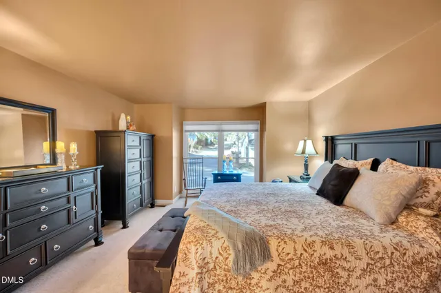 a view of outdoor space with garden and tall buildings