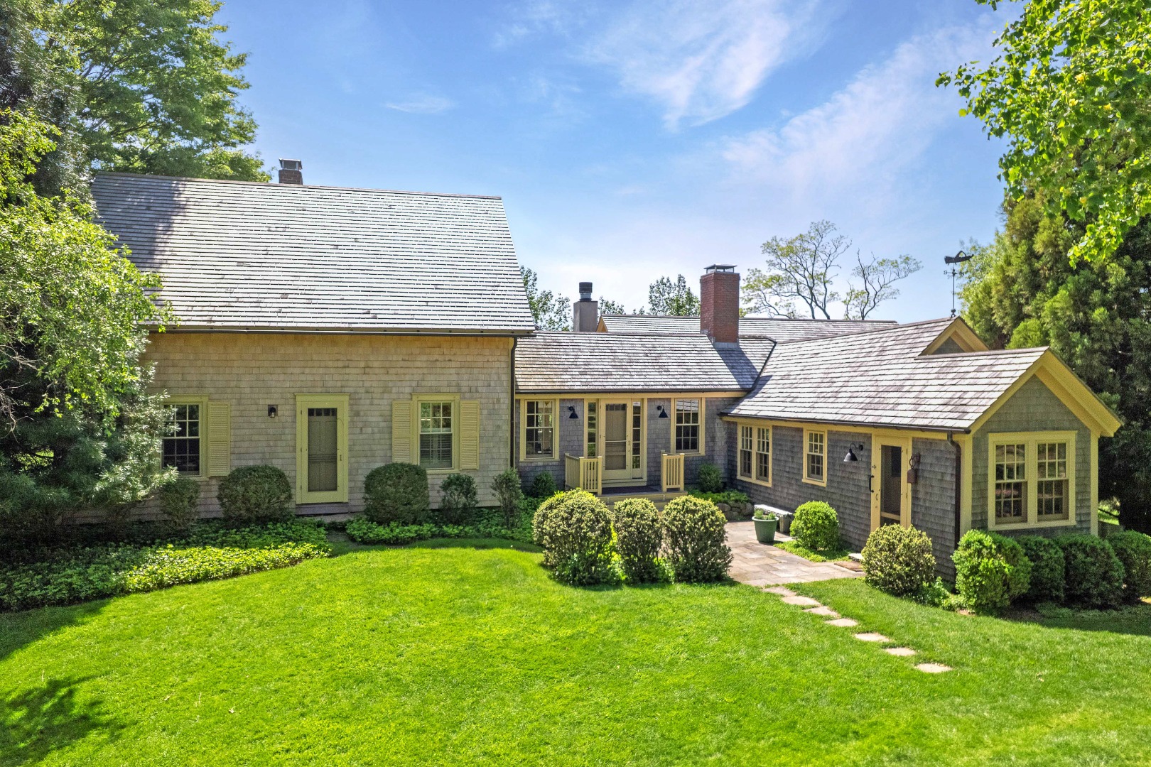 122 Old Farm Road Chilmark, MA 02535 - Photo 4 of 36 a view of a front of a house with a yard