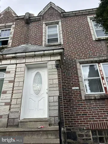 a front view of a house with a door