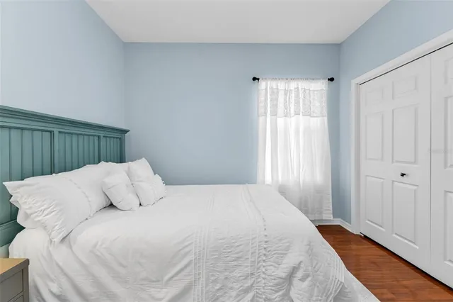 a bathroom with a sink a toilet and shower curtain