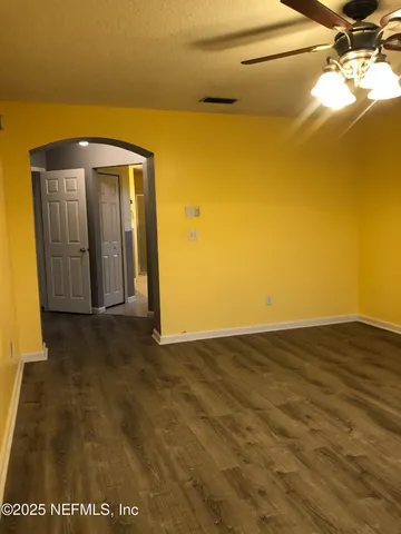 a view of a room with a door