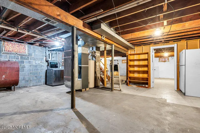 a view of a room with wooden walls