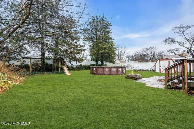 a view of a park with large trees