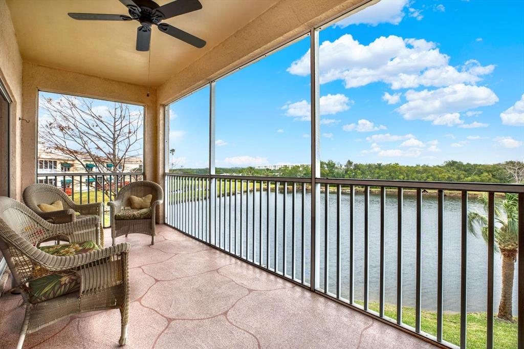 6363 99th Way North, Unit 12A St. Petersburg, FL 33708 - Photo 1 of 1 a view of a balcony with chairs