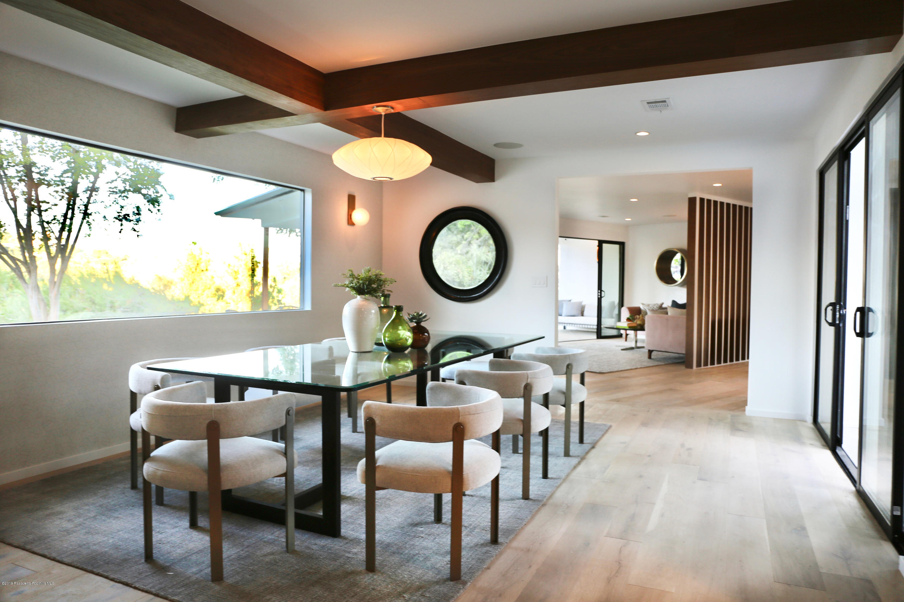 250 La Mirada Road Pasadena, CA 91105 - Photo 11 of 42 a view of a chairs and table in a room