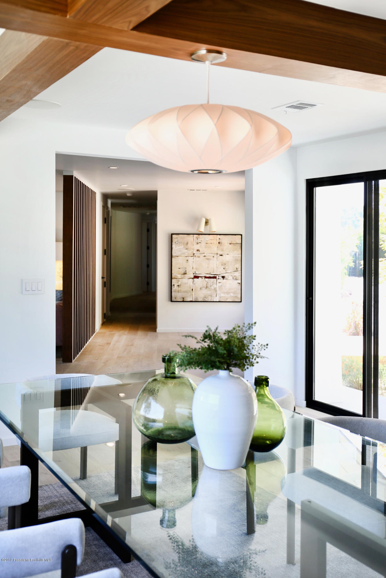 250 La Mirada Road Pasadena, CA 91105 - Photo 12 of 42 a living room with furniture and a potted plant