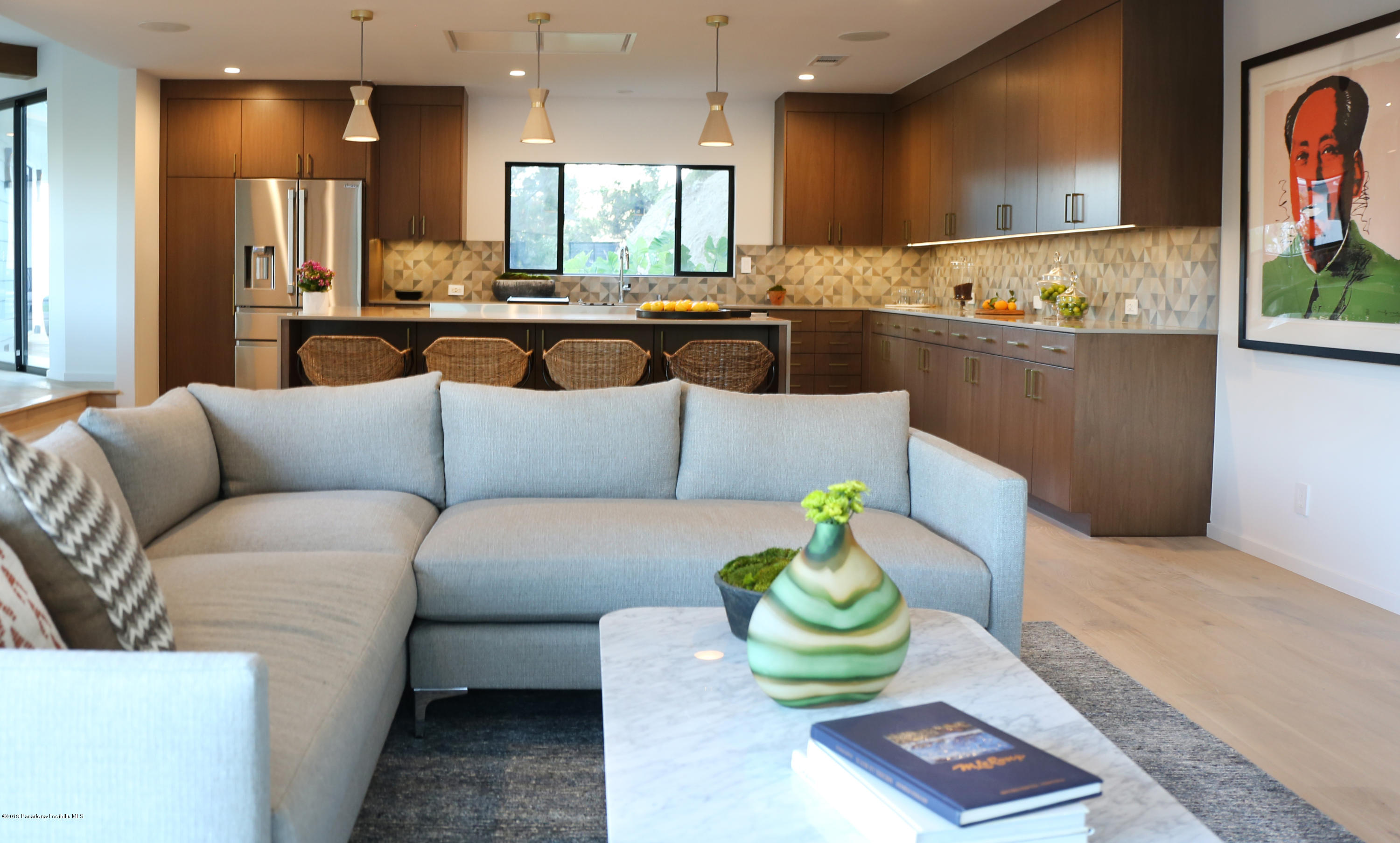 250 La Mirada Road Pasadena, CA 91105 - Photo 17 of 42 a living room with furniture and a large window