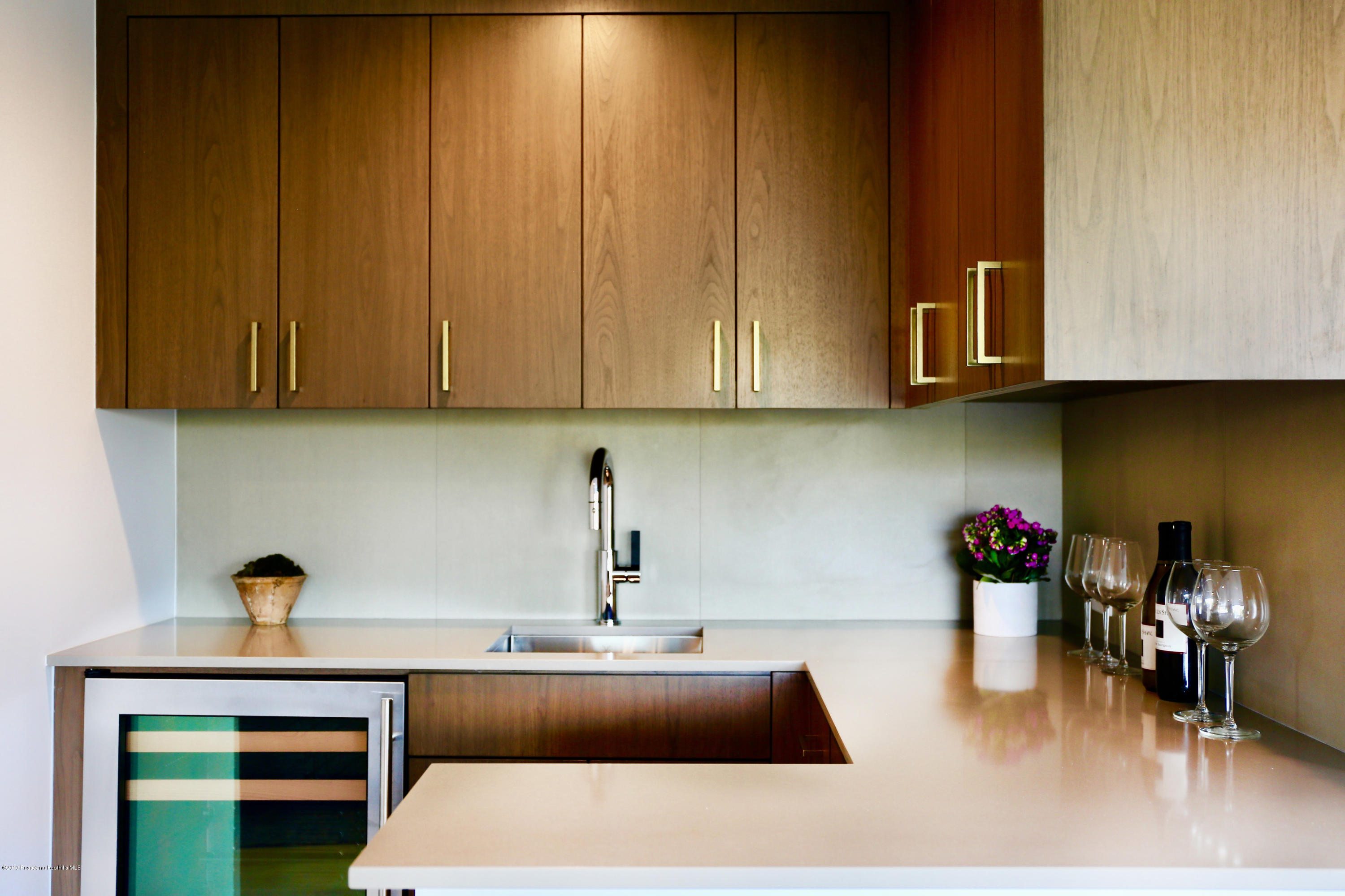 250 La Mirada Road Pasadena, CA 91105 - Photo 19 of 42 a kitchen with a sink cabinets and appliances