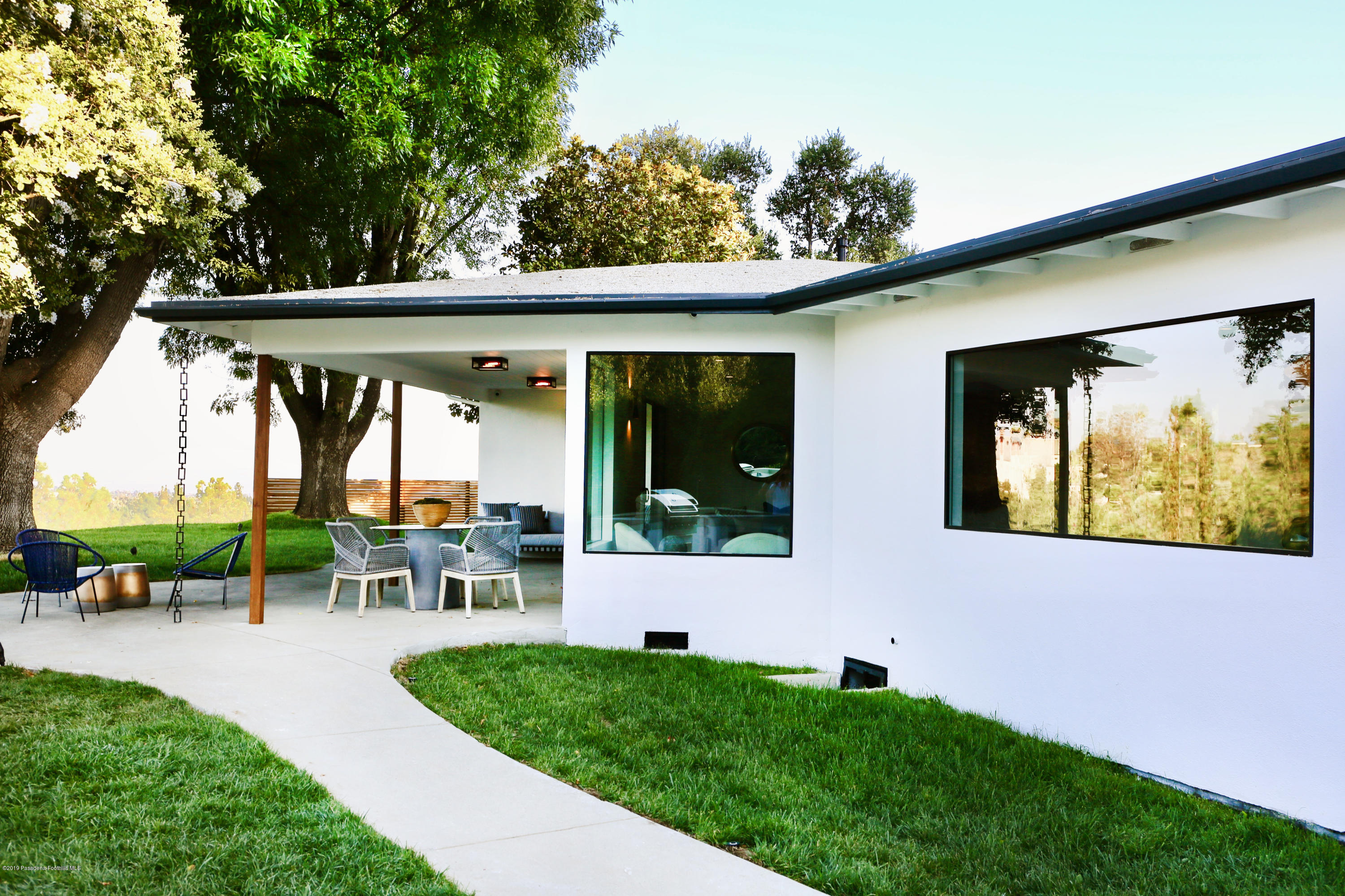 250 La Mirada Road Pasadena, CA 91105 - Photo 25 of 42 a view of an house with backyard porch and garden