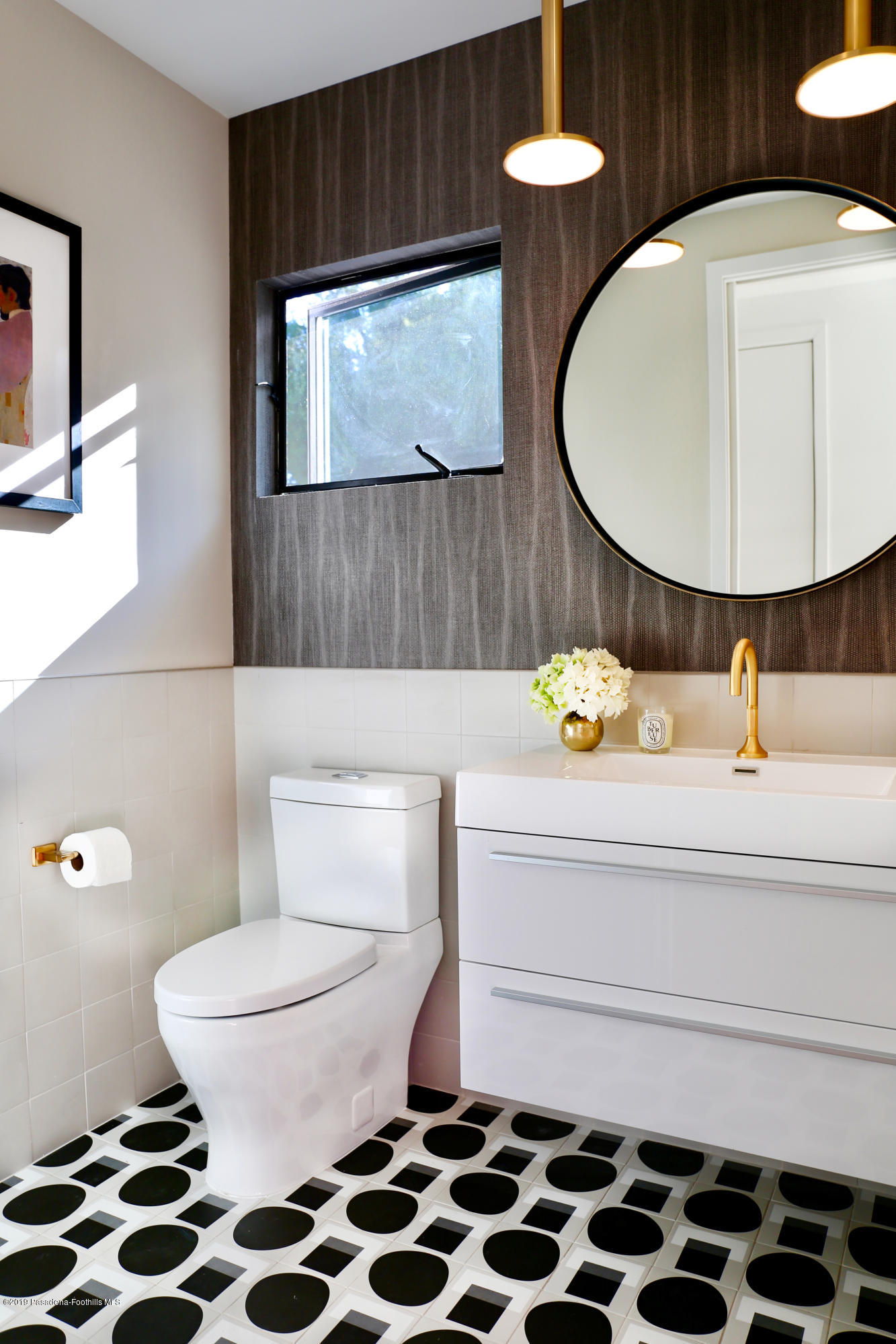 250 La Mirada Road Pasadena, CA 91105 - Photo 28 of 42 a bathroom with a sink a toilet and mirror