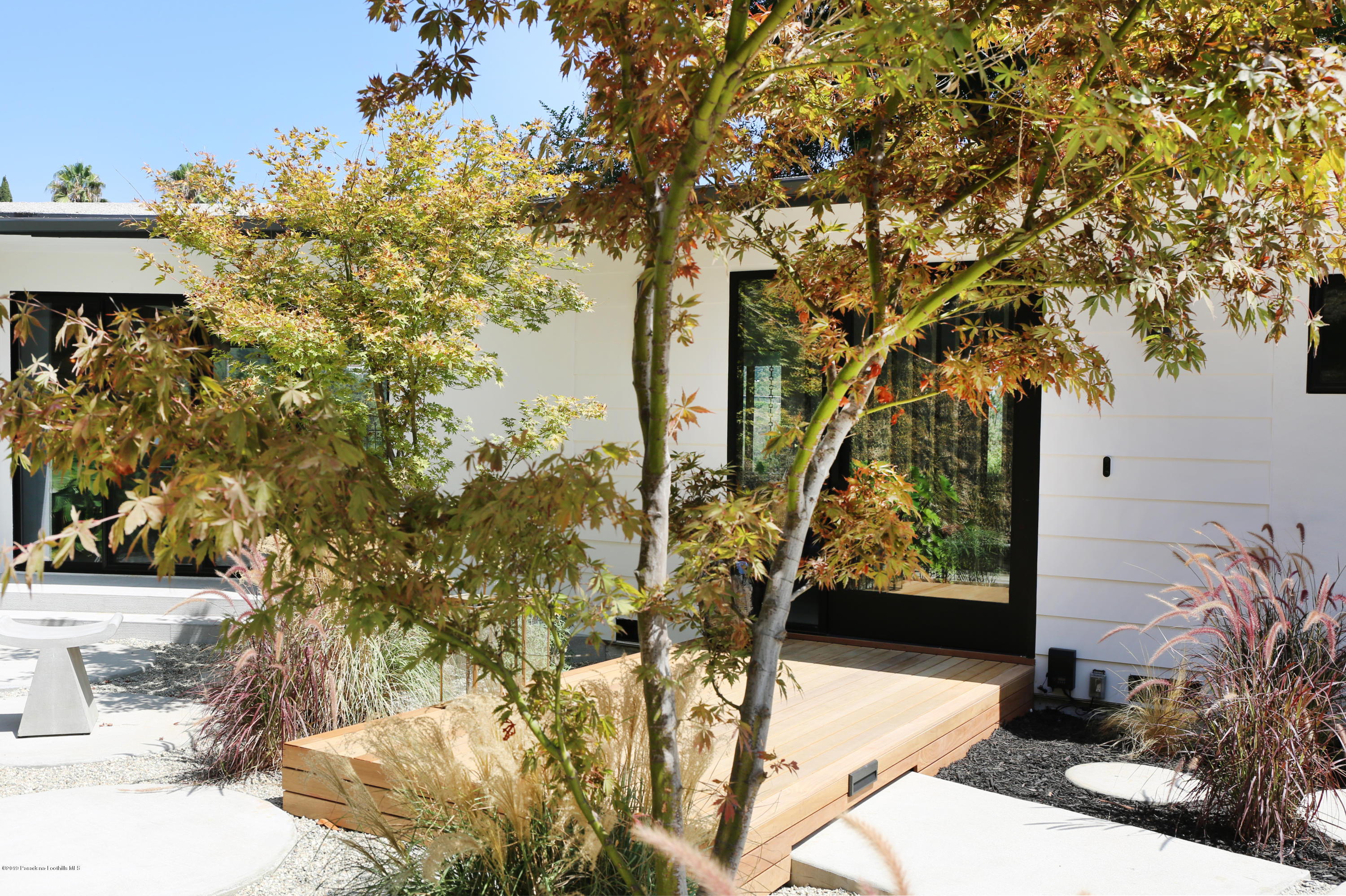 250 La Mirada Road Pasadena, CA 91105 - Photo 4 of 42 a view of a yard with plants and trees