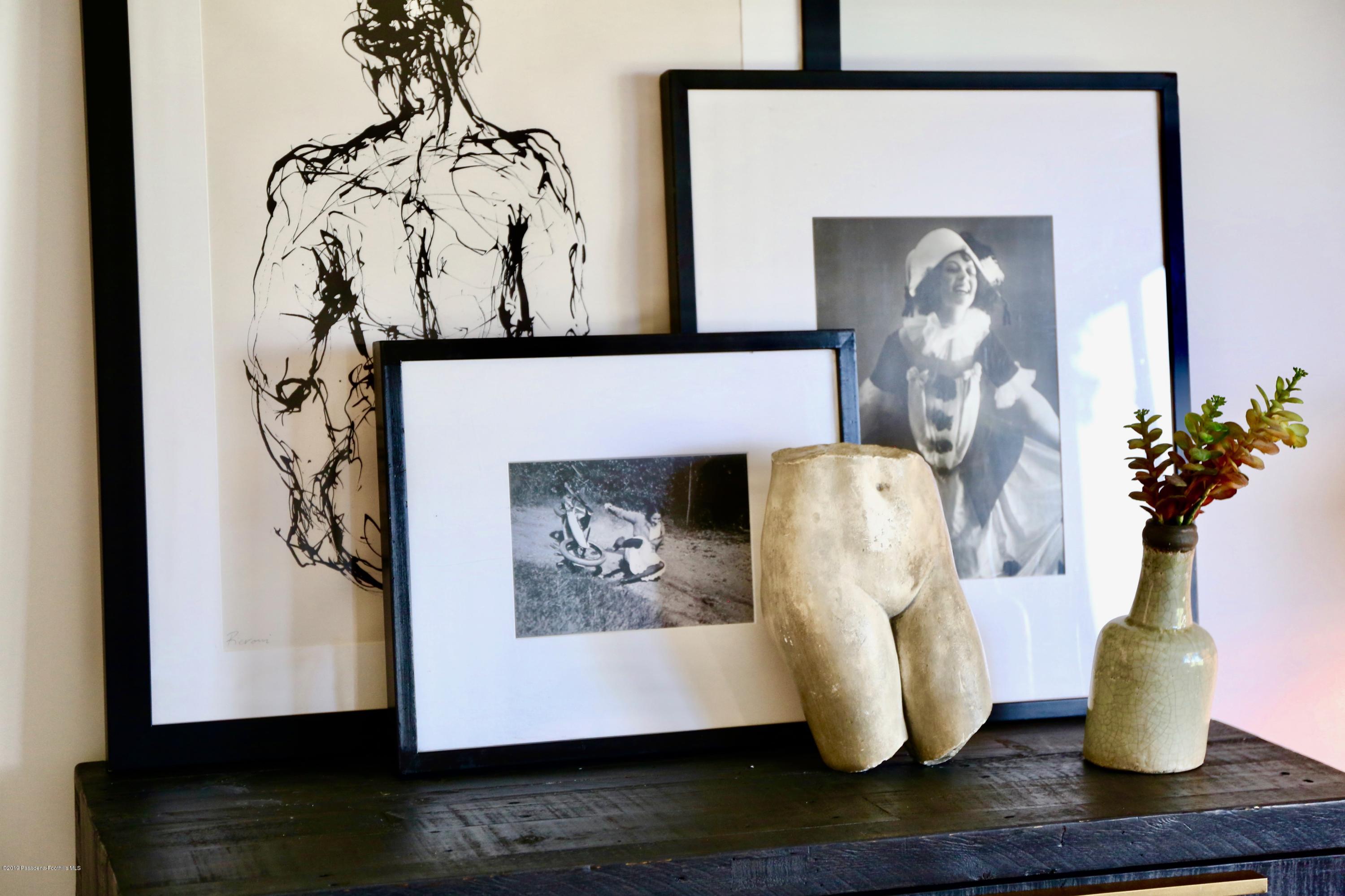 250 La Mirada Road Pasadena, CA 91105 - Photo 31 of 42 a view of a vase of flowers sitting on a table