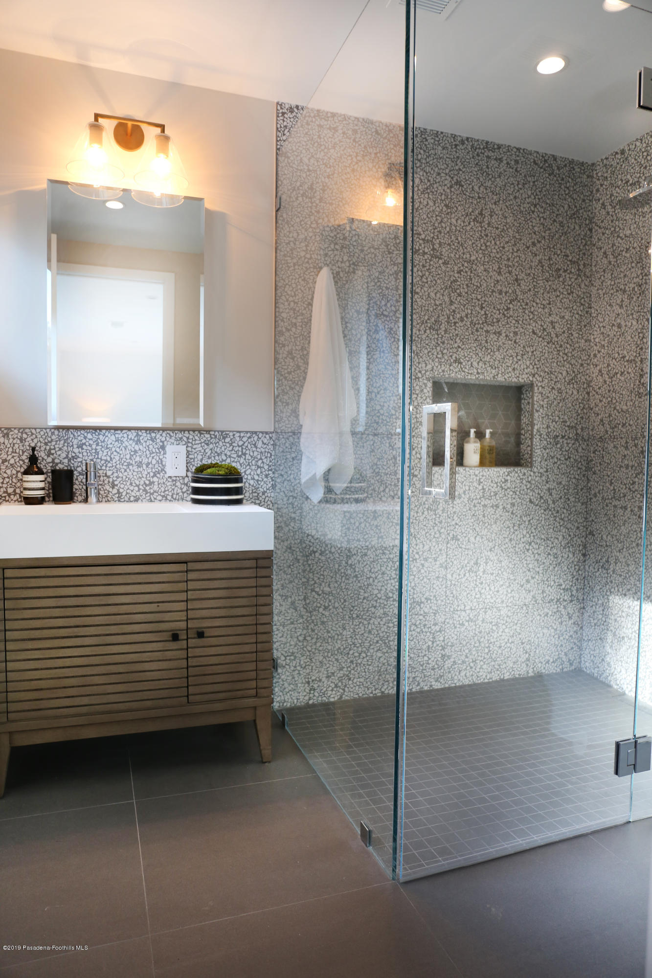 250 La Mirada Road Pasadena, CA 91105 - Photo 35 of 42 a bathroom with a double vanity sink mirror and shower