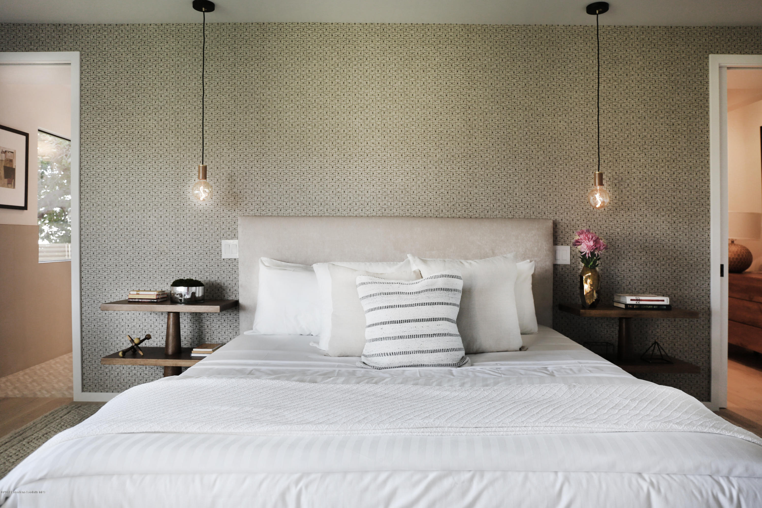 250 La Mirada Road Pasadena, CA 91105 - Photo 37 of 42 a bedroom with a bed and a lamp