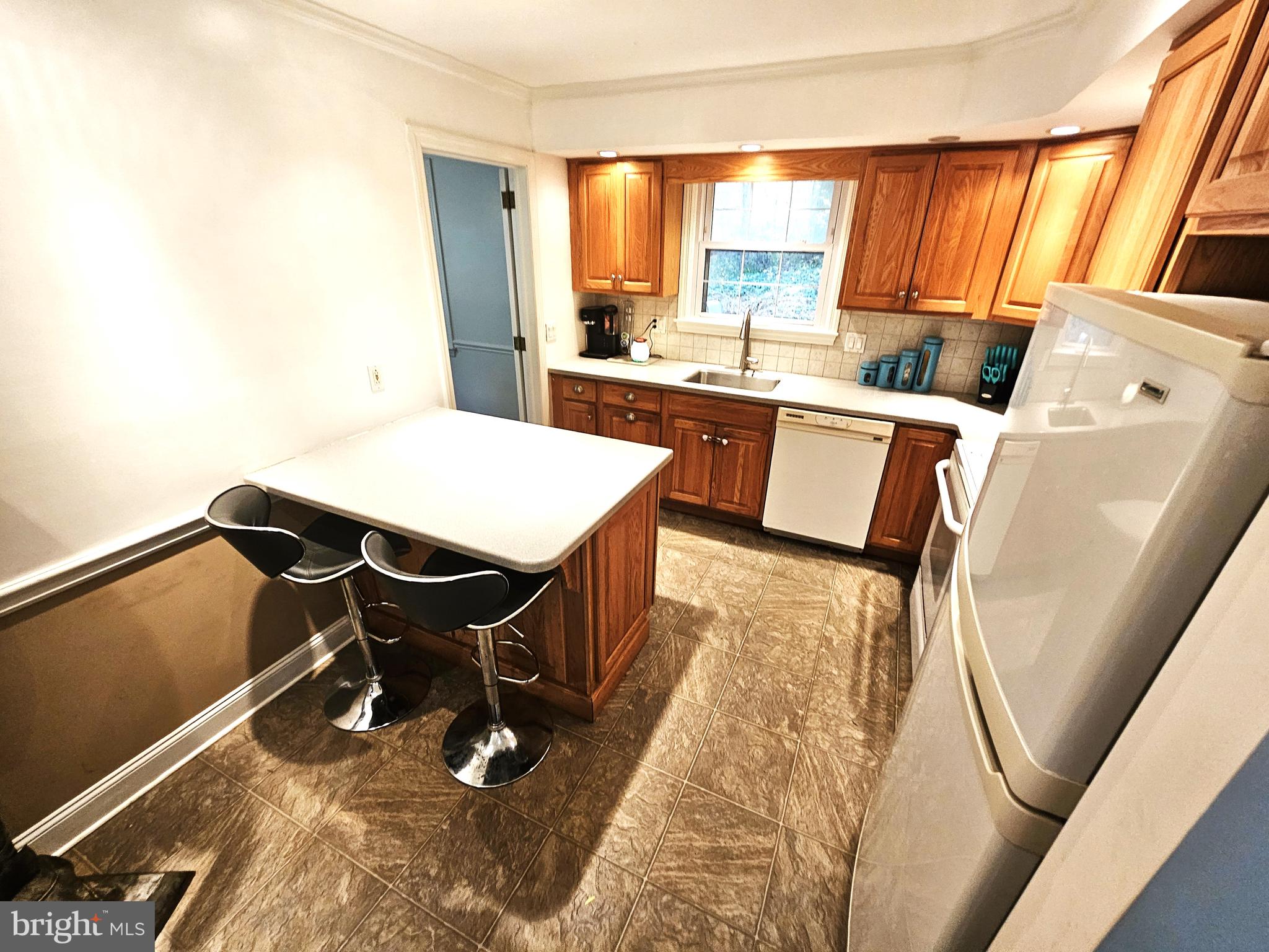757 Auburn Mill Road Hockessin, DE 19707 - Photo 7 of 10 a dining room with a window table and chairs