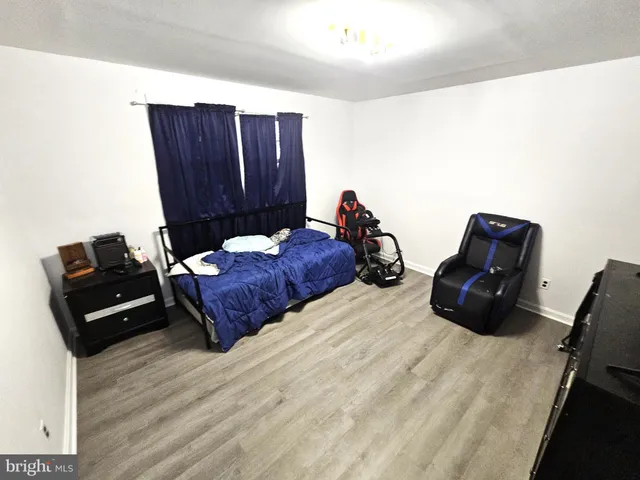 a bed room with a bed and a couch