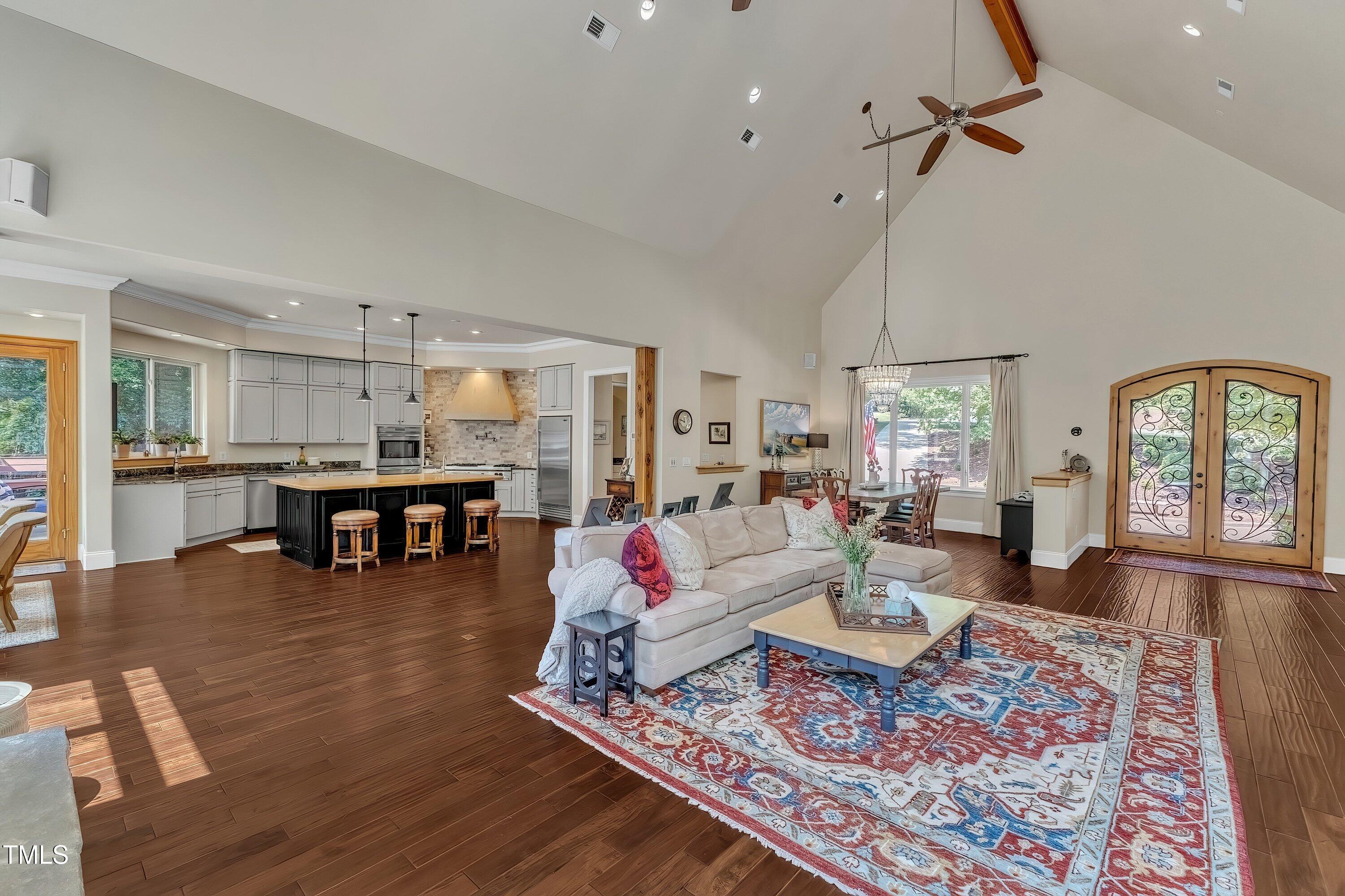 1004 Tobiano Lane Raleigh, NC 27614 - Photo 11 of 48 a living room with furniture and wooden floor