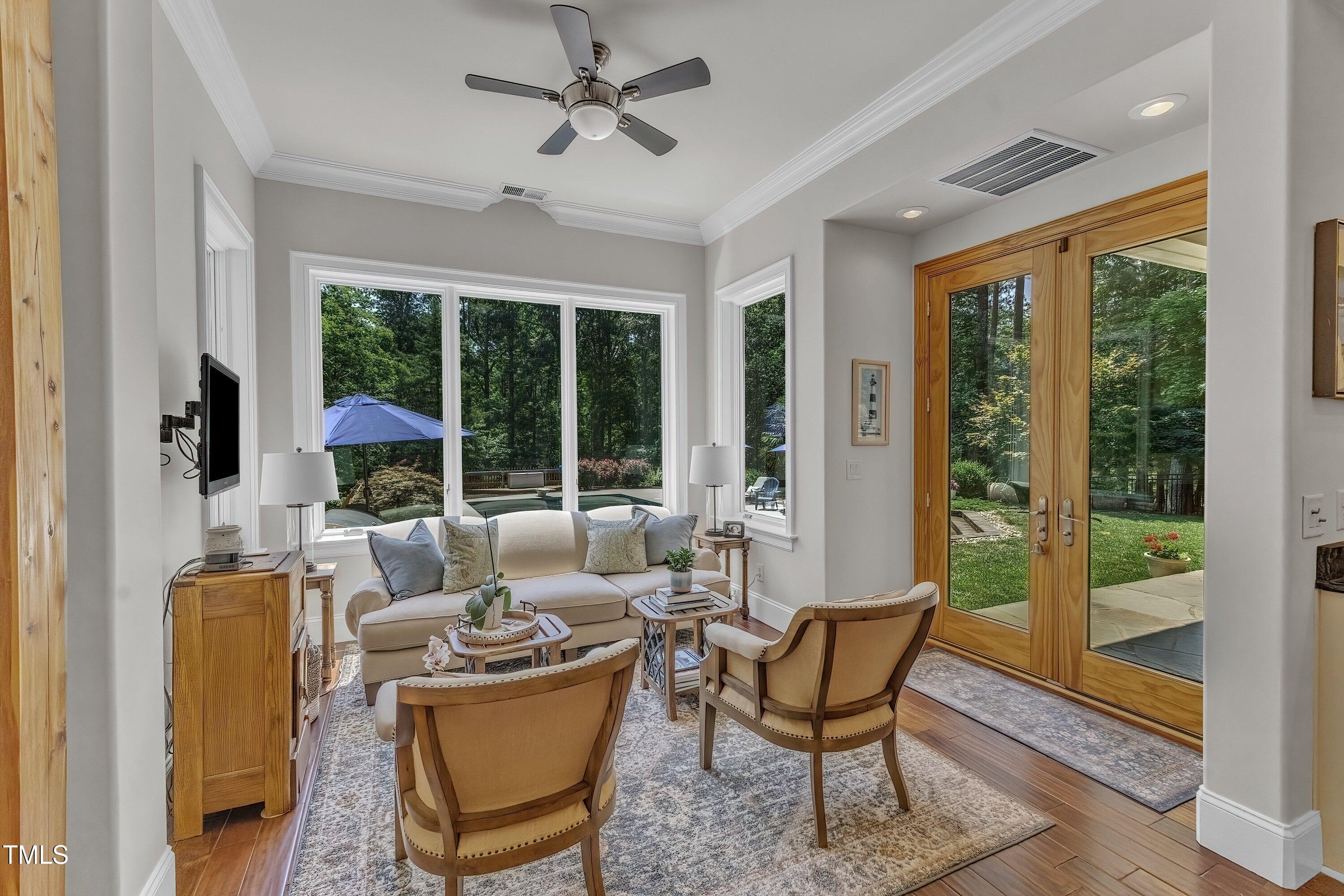 1004 Tobiano Lane Raleigh, NC 27614 - Photo 16 of 48 a living room with furniture and a window