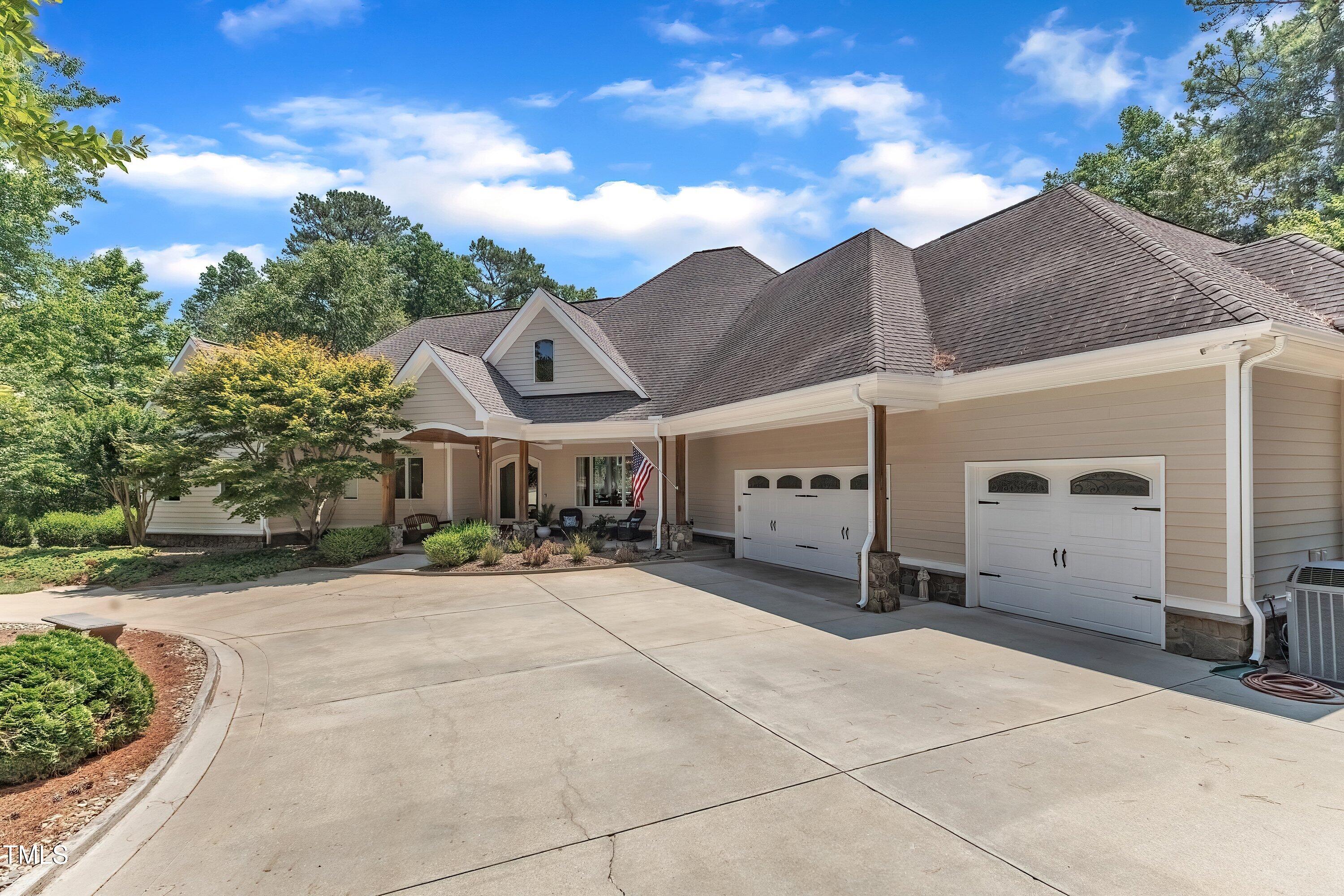 1004 Tobiano Lane Raleigh, NC 27614 - Photo 2 of 48 a view of a house with a yard