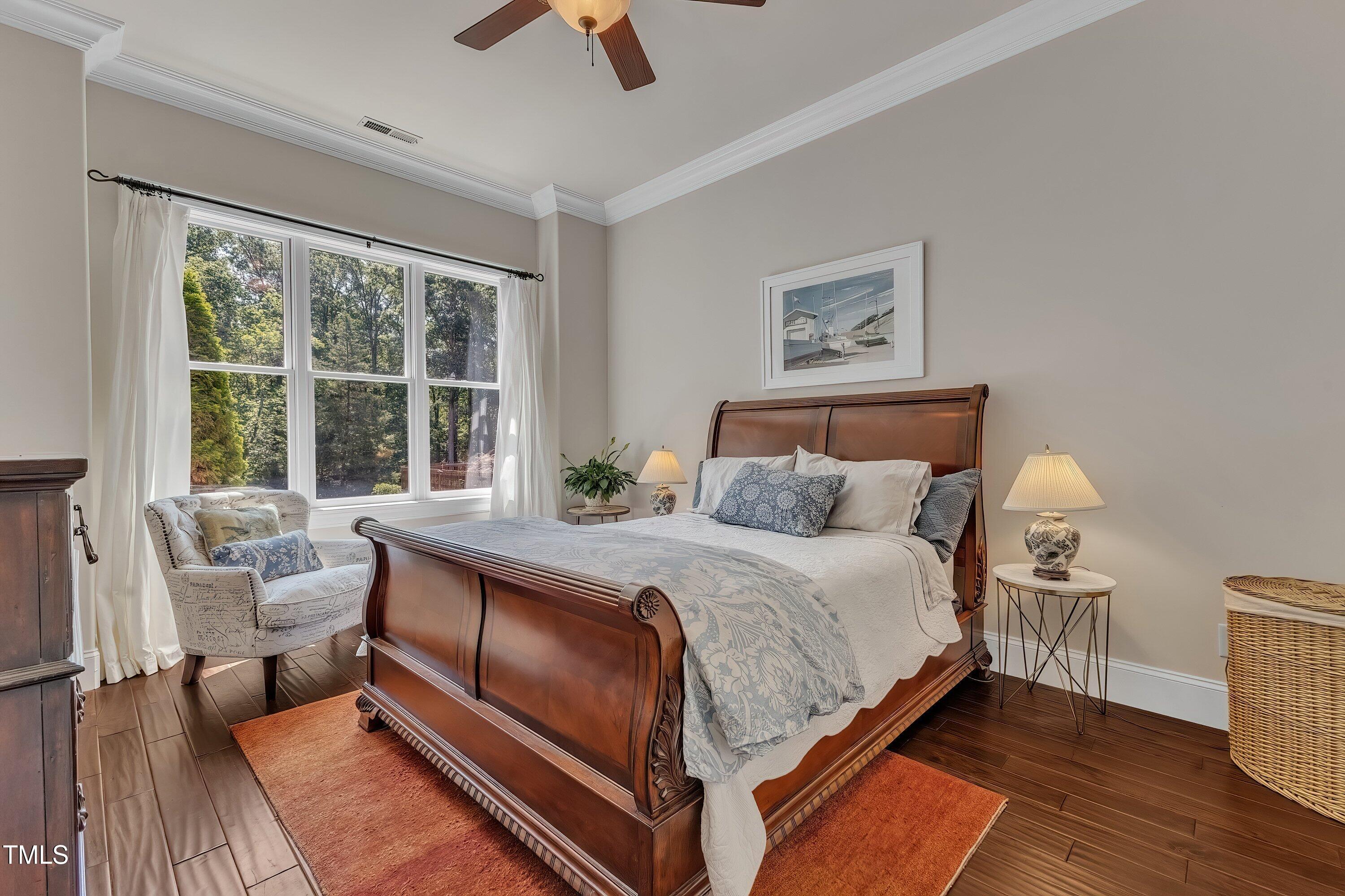 1004 Tobiano Lane Raleigh, NC 27614 - Photo 23 of 48 a bed room with a bed and a chair