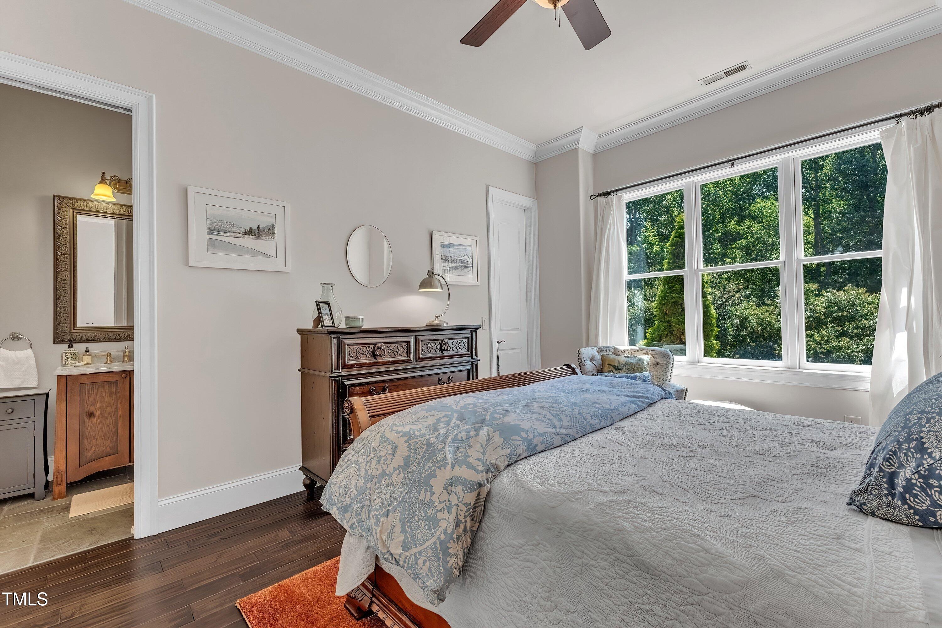 1004 Tobiano Lane Raleigh, NC 27614 - Photo 24 of 48 a bedroom with a bed and a window