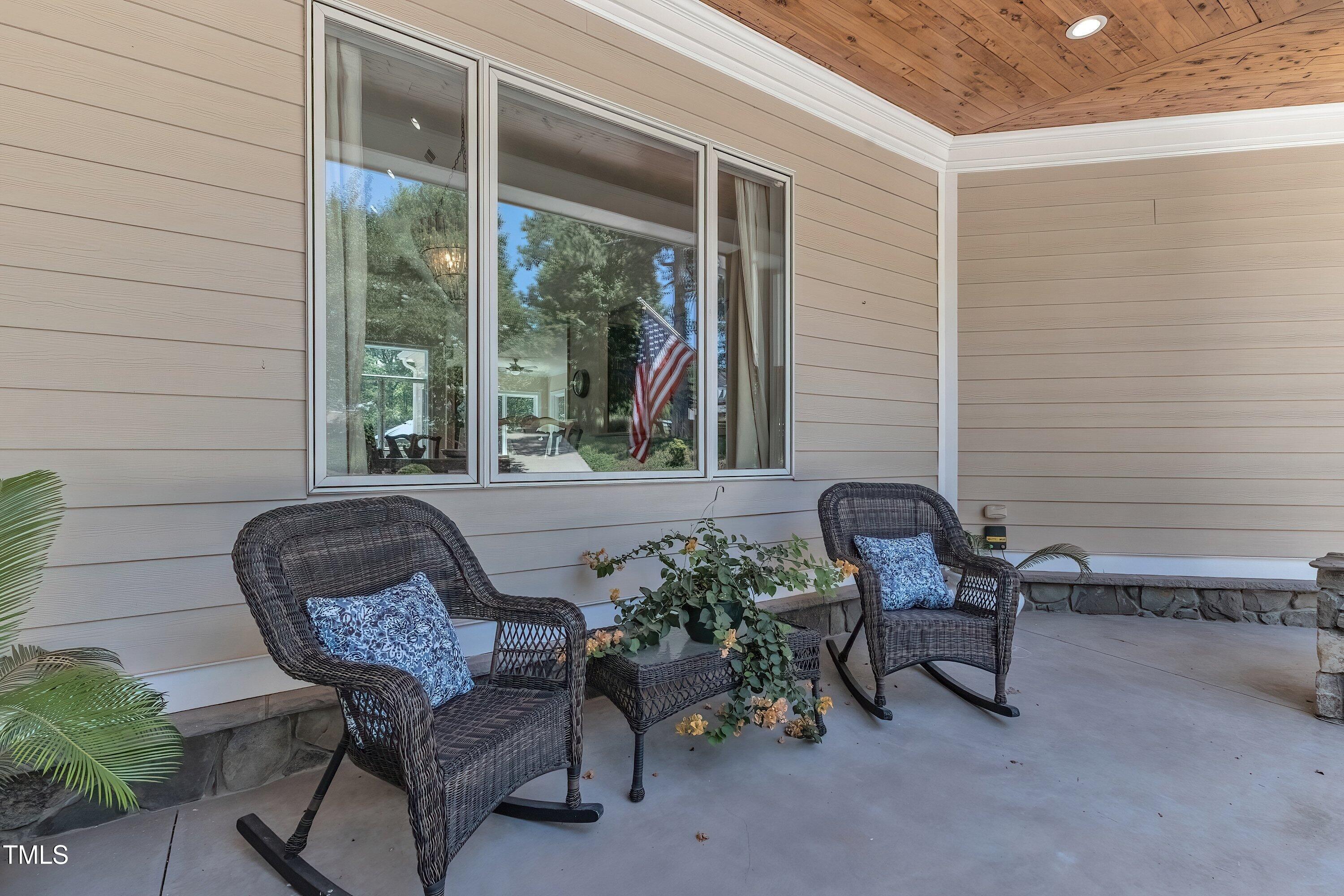 1004 Tobiano Lane Raleigh, NC 27614 - Photo 4 of 48 a view of a two chairs in a patio