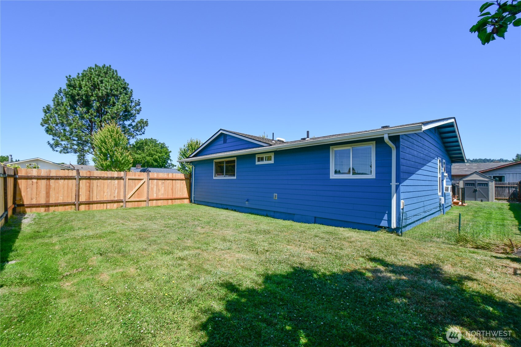 2102 35th Avenue Longview, WA 98632 - Photo 29 of 31 a view of backyard of house with wooden fence