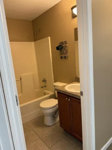 an empty room with closet area