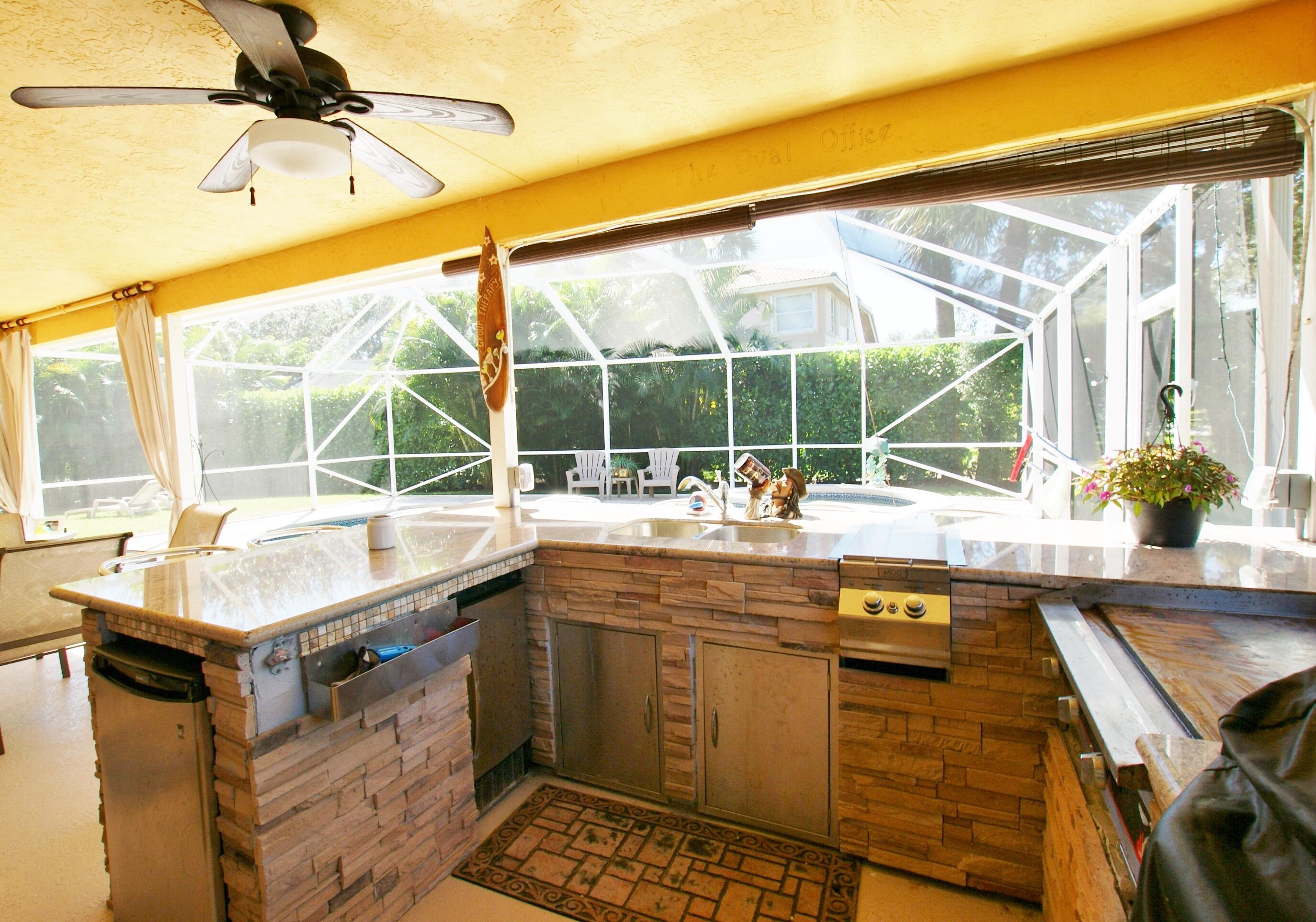 1225 Egret Circle South Jupiter, FL 33458 - Photo 30 of 36 Summer Kitchen