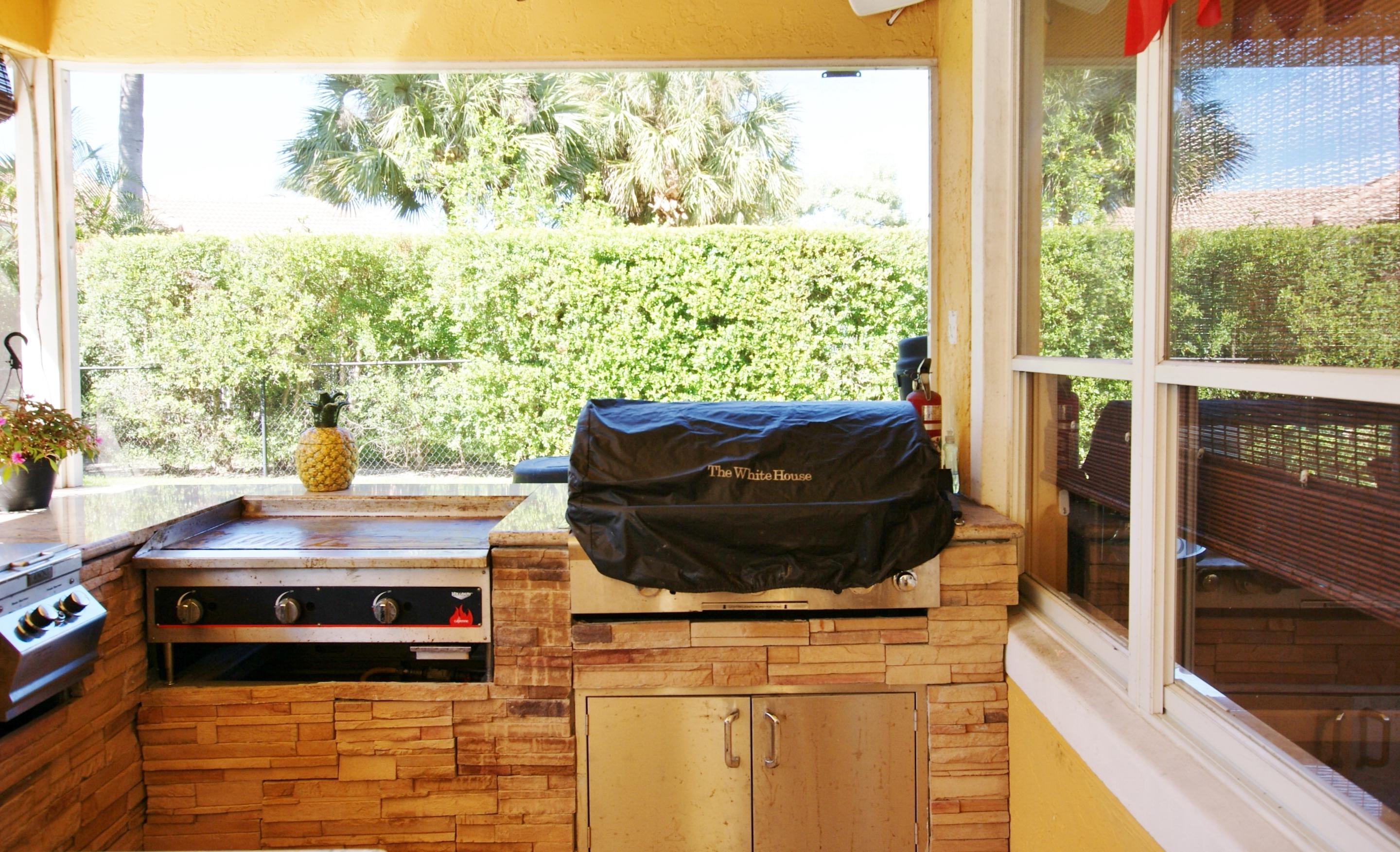 1225 Egret Circle South Jupiter, FL 33458 - Photo 31 of 36 Summer Kitchen