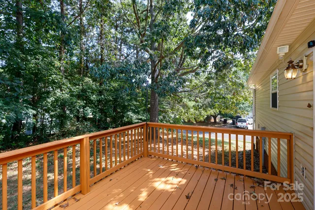 a view of a wooden roof deck