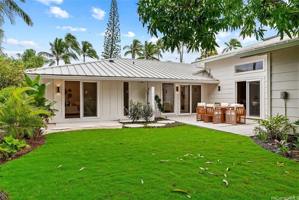 a front view of a house with patio