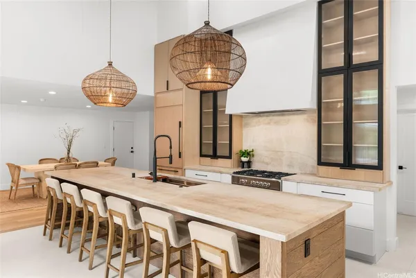 a kitchen with a table and chairs