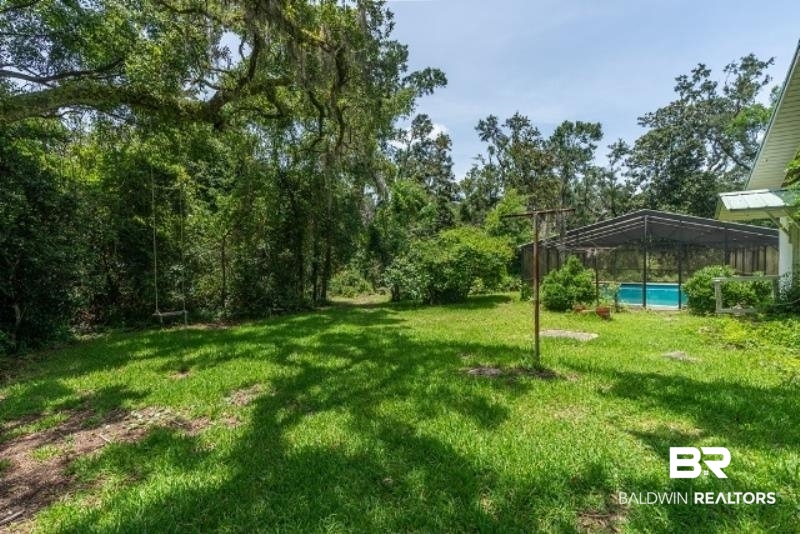 10970 County Road 99 Lillian, AL 36549 - Photo 34 of 38 yard around pool area