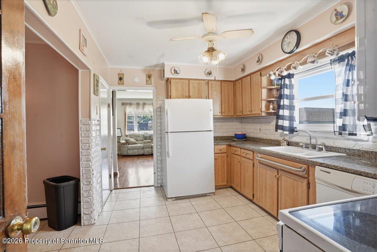 101 Stone Street Moosic, PA 18507 - Photo 10 of 53 a kitchen with a refrigerator sink and cabinets