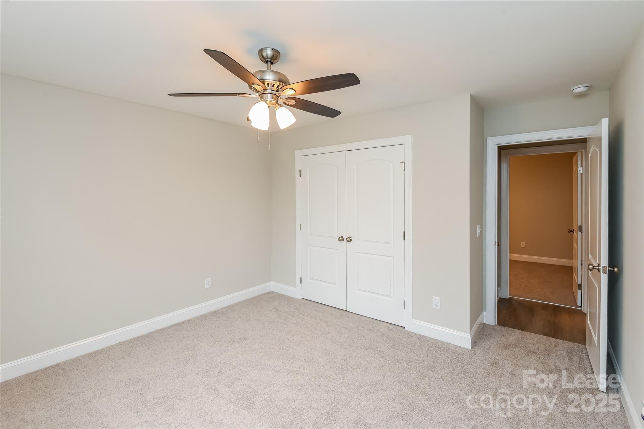 131 Powder Street Southwest Concord, NC 28025 - Photo 13 of 14 wooden floor in an empty room