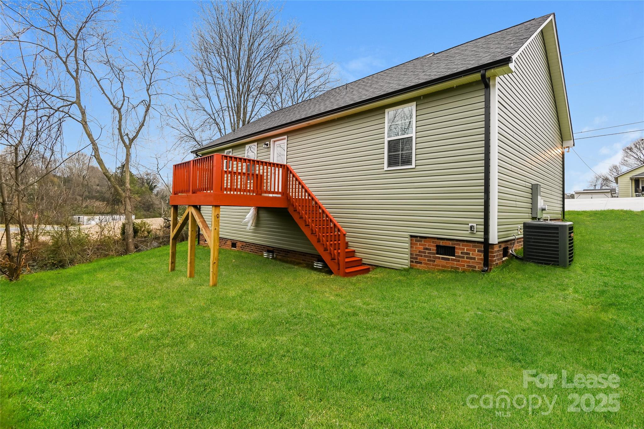131 Powder Street Southwest Concord, NC 28025 - Photo 14 of 14 a view of a house with a yard