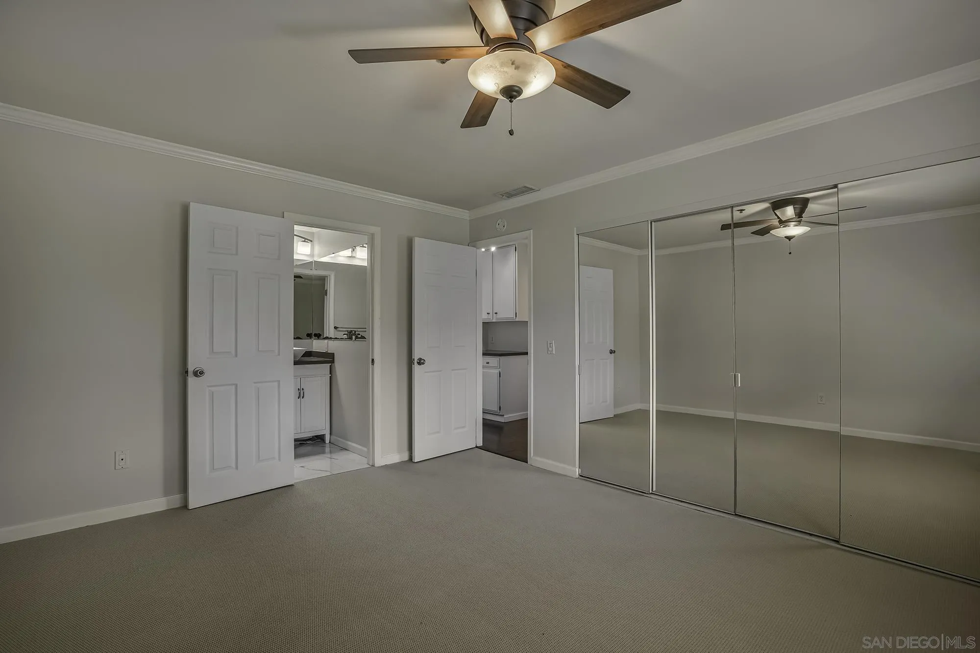 139 Mangano Circle Encinitas, CA 92024 - Photo 12 of 18 a view of empty room with a ceiling fan and window